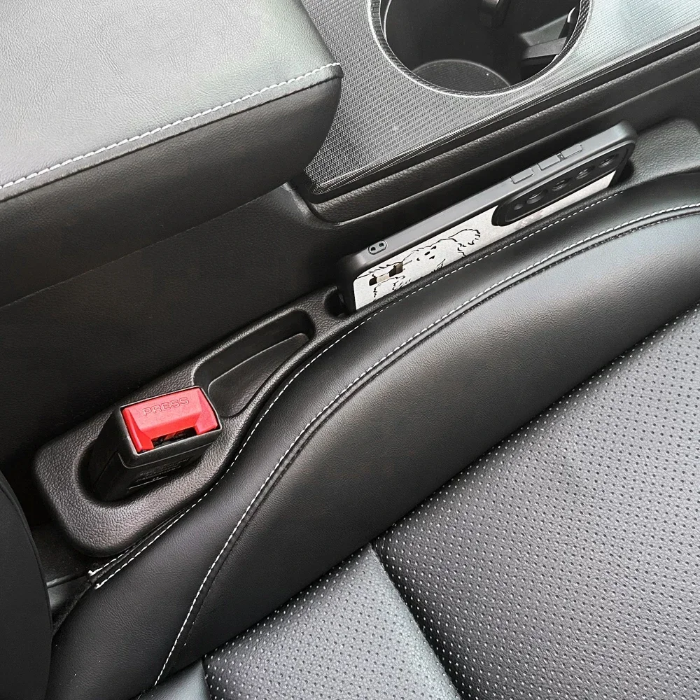 Car Accessories Quirky - 2 szt. Wypełniacz szczeliny fotela samochodowego,